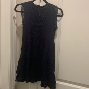 Girl’s dress lace around the around the arms. Home is smoke and pet free.